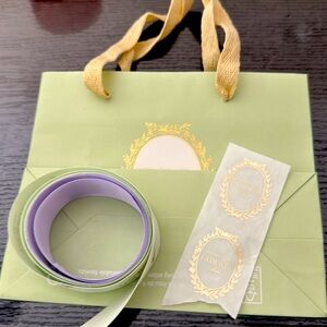 La duree ribbon spool ( ribbon is cut ), bag & stickers